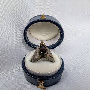 Elegant Silver and Red Teardrop Ring